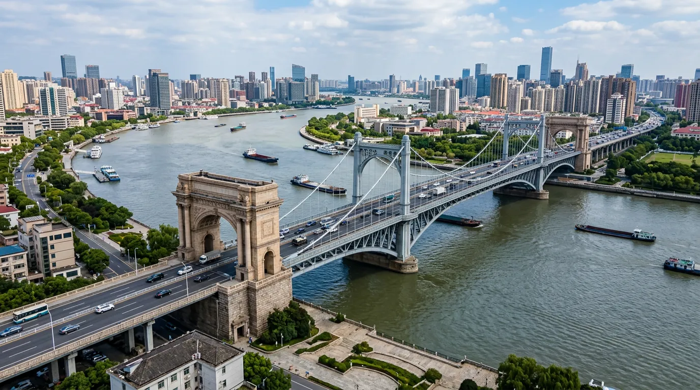Bridge spanning river with modern and classical design elements, river landscape below, urban infrastructure, steel and stone construction, traffic flowing